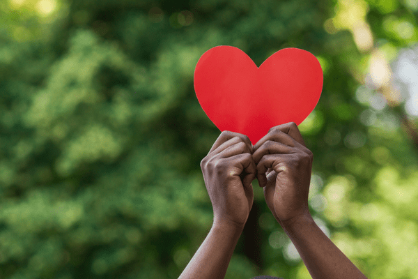 Hands holding a heart Hands holding a heart