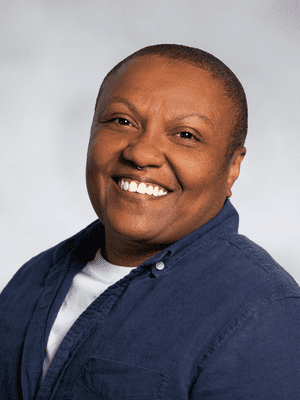 Krisma Jackson 300x400 IDEA Committee member Krisma Jackson smiling.